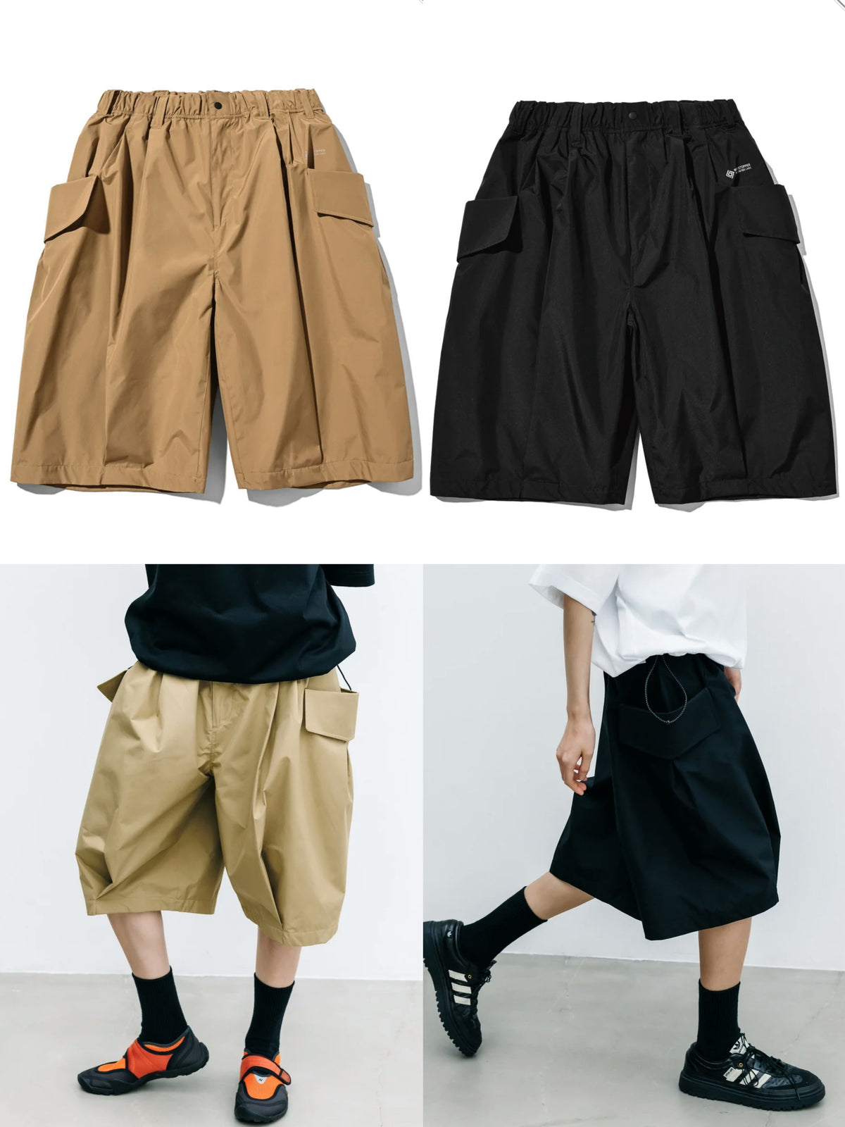 CLESSTE
+PHENIX WINDSTOPPER® BY GORE-TEX LABS CITY FLAP WIDE BALLOON HALF PANTS