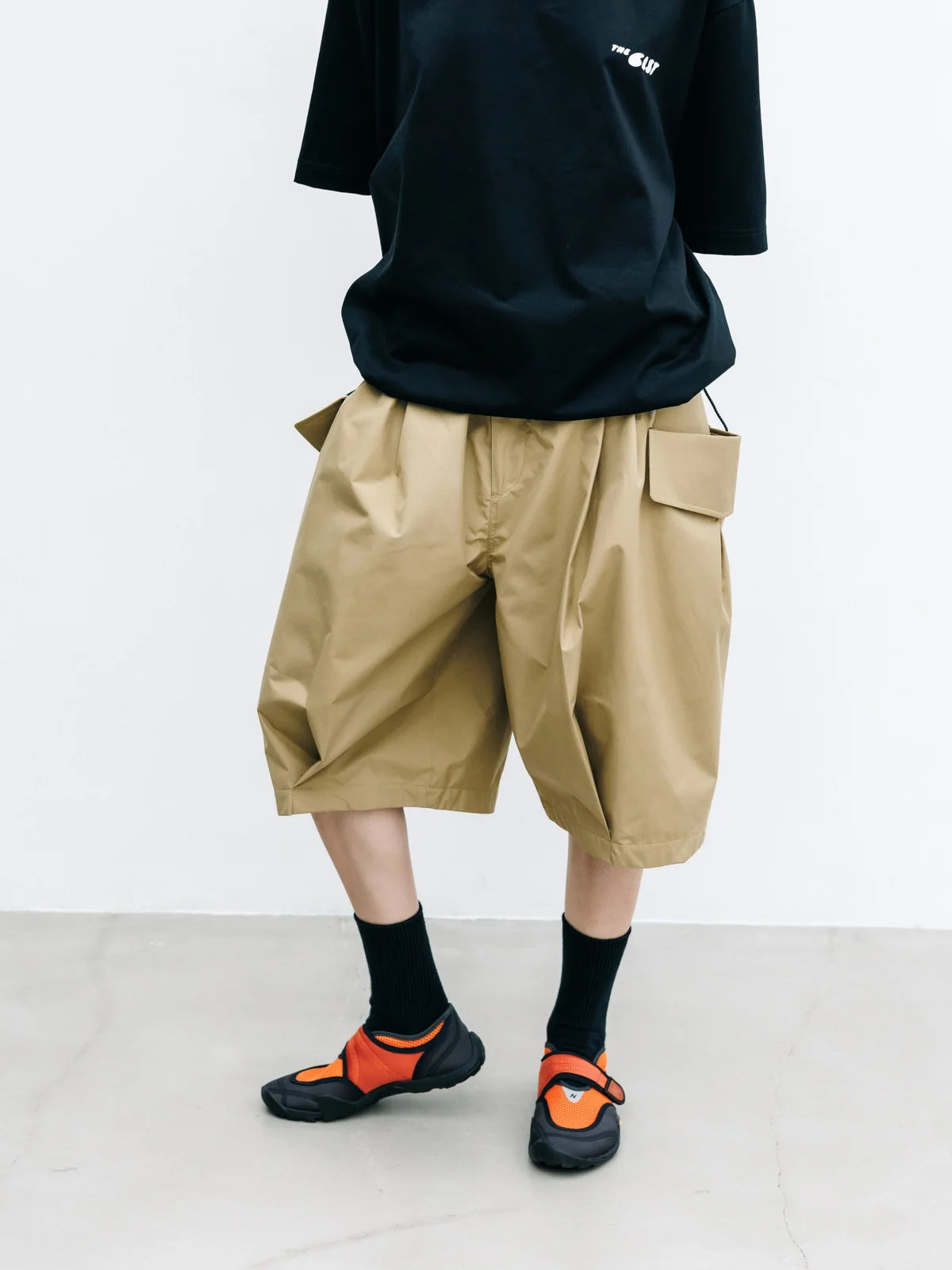 CLESSTE
+PHENIX WINDSTOPPER® BY GORE-TEX LABS CITY FLAP WIDE BALLOON HALF PANTS