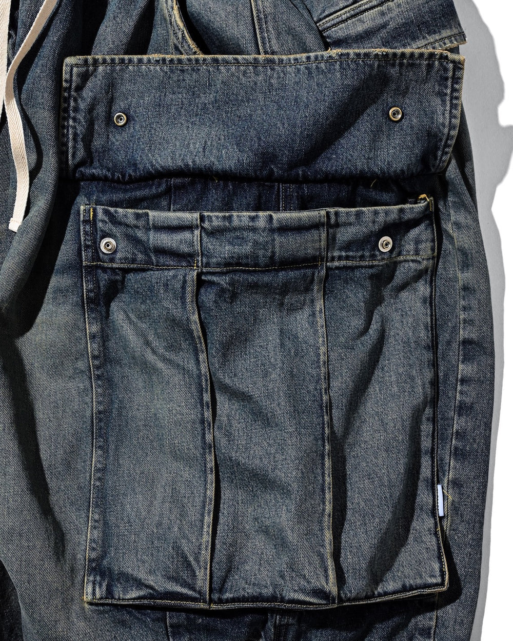 CLESSTE
VINTAGE DYED SELVEDGE DENIM CITY MEGA POCKET BALLOON CARGO HALF PANTS